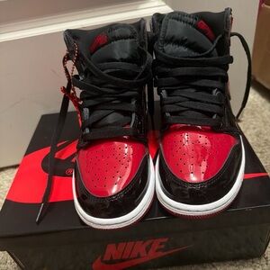 Nike Jordan 1 Patent Black and Red High-Top Sneakers